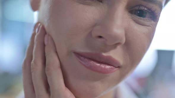 Close Up of Young Woman Face with Toothache