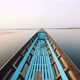 Old Blue Wooden Motor Boat Floats on the Calm River Water Surface Early Morning. Inle Lake, Myanmar - VideoHive Item for Sale