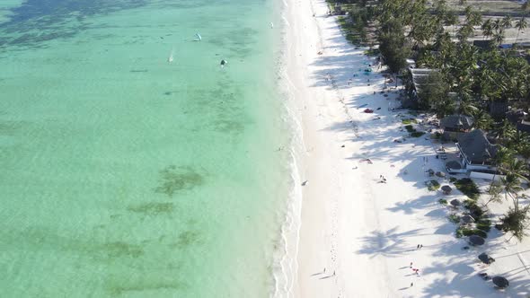 A Boat Floats on the Water of the Ocean Near the Coast of Zanzibar Tanzania