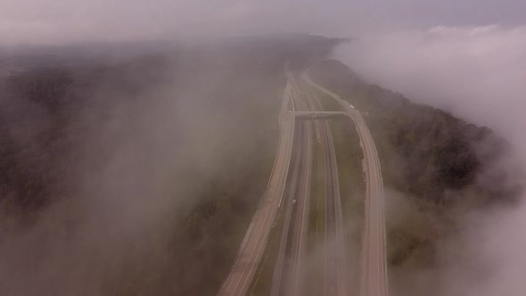 Clouds And Fogs Over Interstate 75 And Rarity Mountain Road In Newcomb, Tennessee, USA. - aerial