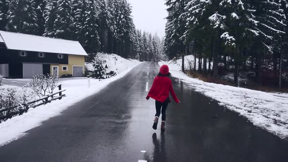 A Beautiful Smiling Girl Running to the Wood