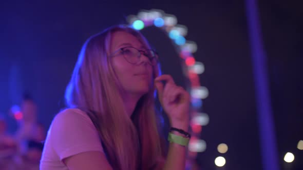 Woman Enjoys Concert