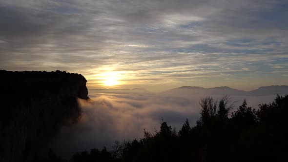 Dawn Above the Moving Clouds