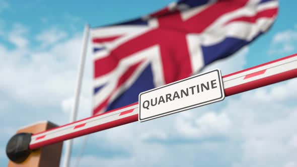 Barrier with QUARANTINE Sign Opens at Flag of the UK