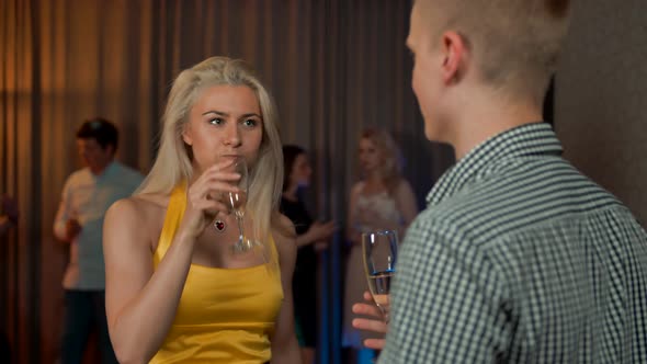 Sexy Lady Flirt with Young Man at Private Party