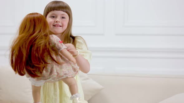 Girl Dancing with Her Doll