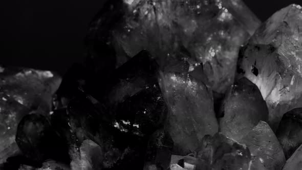 Healing Crystal Stone Macro Mineral, White Rough Quartz Crystals on Black Background. Mystery