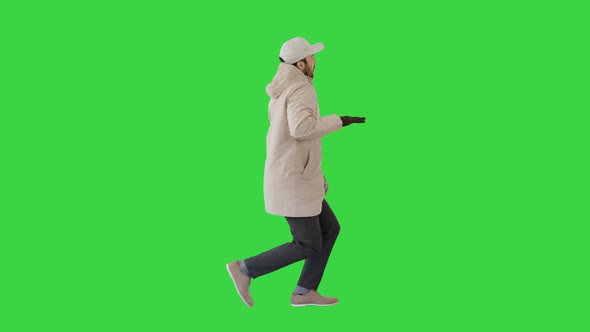 Hip-hop Man Singing Rap, Walking and Making Gestures on a Green Screen, Chroma Key.