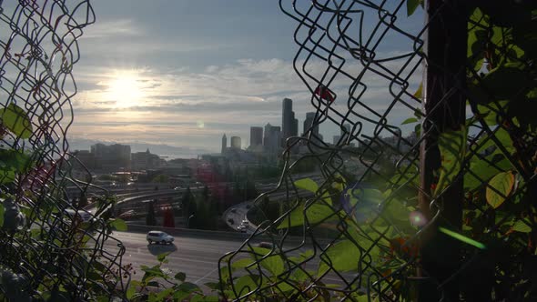 Cinematic Cityscape Dolly Reveal Of Seattle Skyline With Sun Flare alt