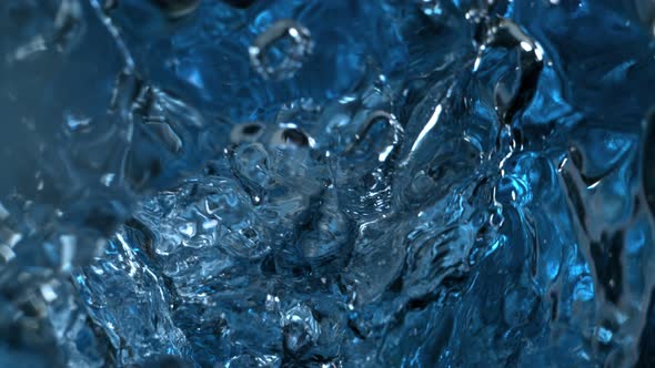 Super Slow Motion Shot of Water Texture Flowing in Glass Bottle at 1000Fps