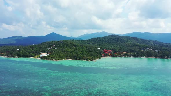 Aerial above nature of exotic coastline beach break by blue sea and white sandy background of a dayo