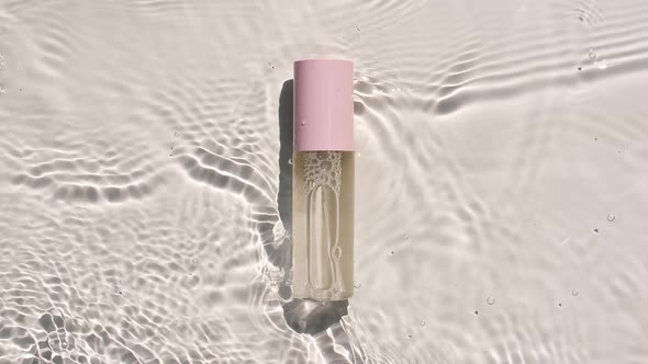 Cosmetic Bottle Vial for Oil Liquid Collagen Serum on Water Surface with Drops