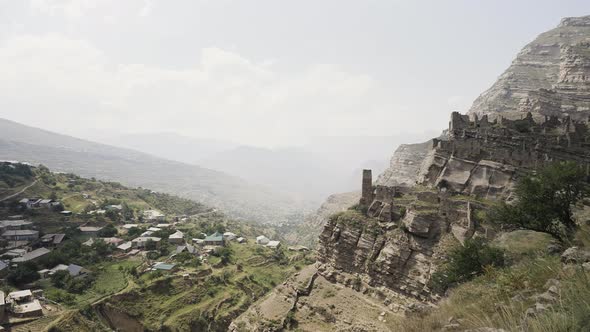 Ruins of ancient village with abandoned buildings