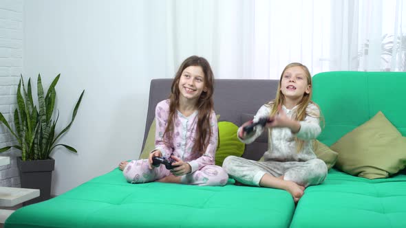 Kids Playing with Game Consoles