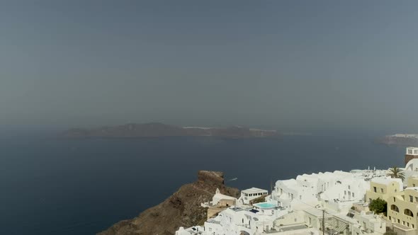 Aerial view of traditional houses on Santorini island, Imerovigli, Greece.