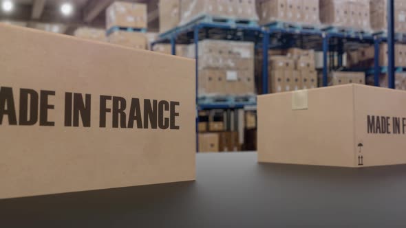 Boxes with MADE IN FRANCE Text on Conveyor