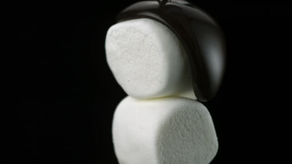 Chocolate sauce on marshmallow, Slow Motion