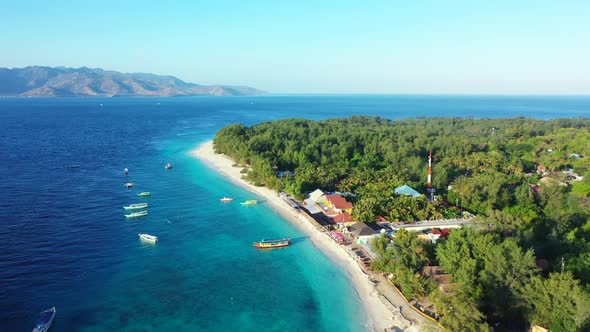 Aerial top view nature of beautiful seashore beach lifestyle by shallow water with white sand backgr