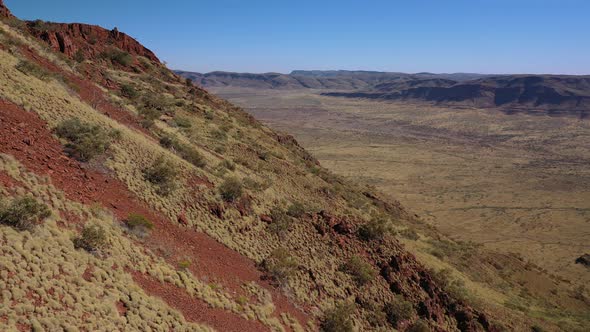 Summit of Mt Bruce, Karijini National Park, Western Australia Sunrise Sunset 4K Aerial Drone