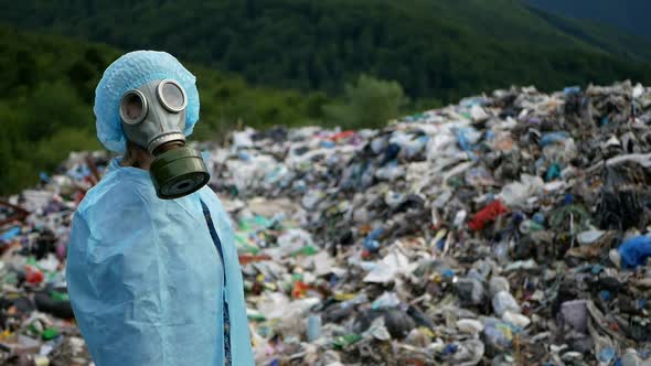 Ecological catastrophe, Apocalypse or armageddon concept. woman is wearing gas mask.