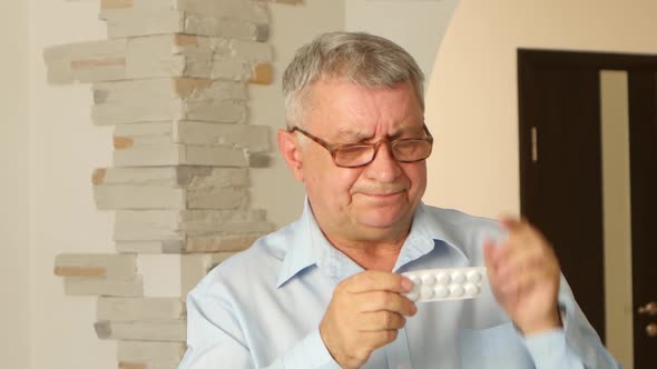 Grandpa Reads the Instructions on the Tablets, but He Does Not See His Poor Eyesight