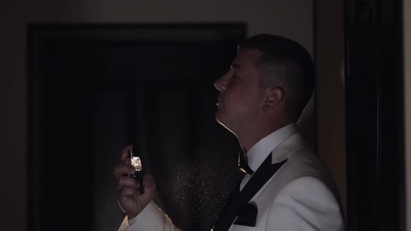 Groom Splits Perfume or Deodorant on Hisself Wedding Day Slow Motion Well Dressed Businessman