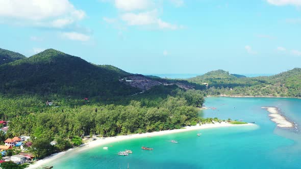 Wide angle aerial copy space shot of a sunshine white sandy paradise beach and blue sea background i