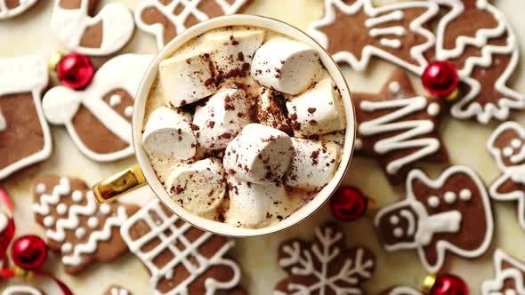 Cup of Hot Chocolate and Christmas Shaped Gingerbread Cookies