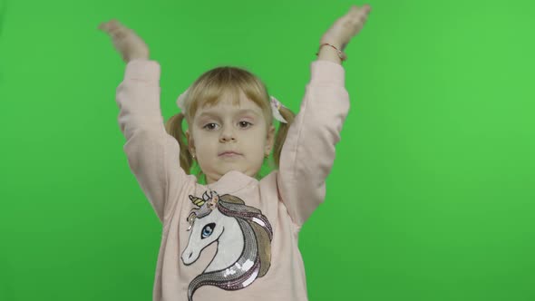 Girl in Unicorn Sweatshirt Dancing