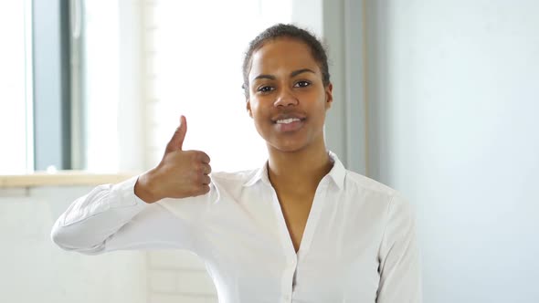 Black Woman Gesture of Thumbs Up