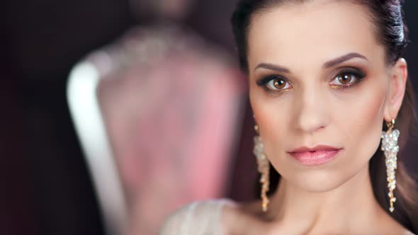 Closeup Confident Face of Beautiful European Woman with Amazing Evening Makeup and Perfect Skin