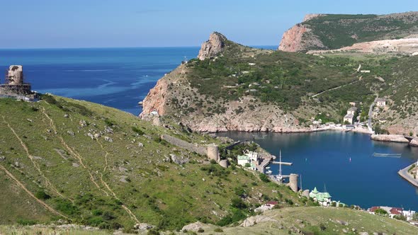 Panoramic View From Hill to Sea Bay with Yachts and Small Coastal Town in Mountain Area Ruines of