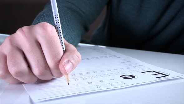 Student Hands Writing