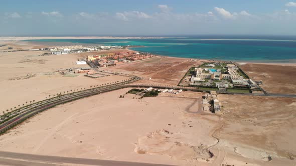 Flying from above over the hotel and the desert near Hurghada.