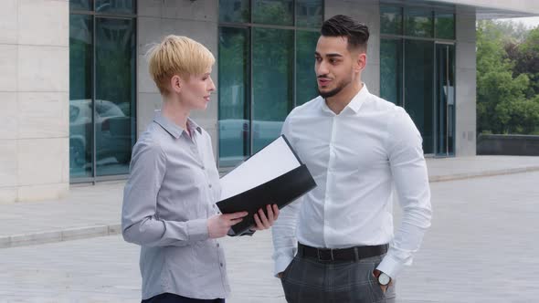 Diverse Corporate People Negotiating Outdoor