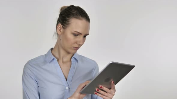 Young Businesswoman Browsing Internet on Tablet