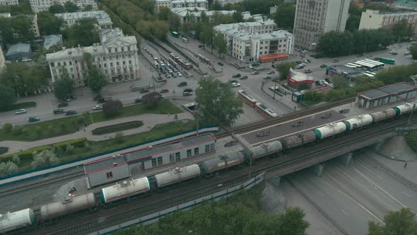 Aerial View of the Street with Traffic Next To the Railway Tracks