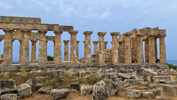 Ruins of collapsed waterfront Greek temples and columns at Selinunte archaeological park in Sicily,