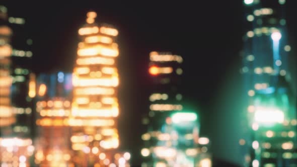 Blurred Cityscape Background Scene at Night alt