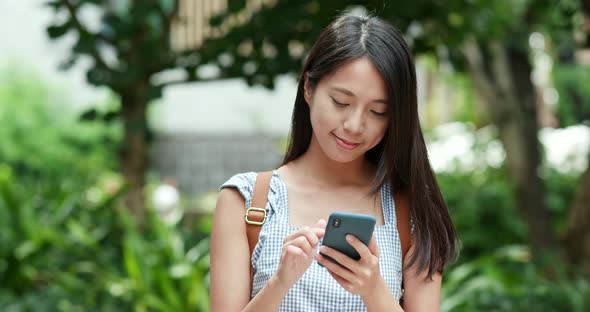 Woman use of mobile phone