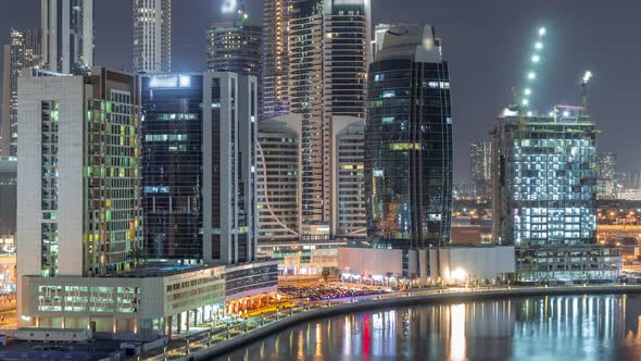 Bright Skyscrapers in Dubai Near Canal Aerial Timelapse