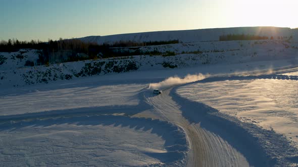 Aerial View of an Ice Rally on a Snowy Track