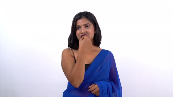 Confused Indian woman in saree