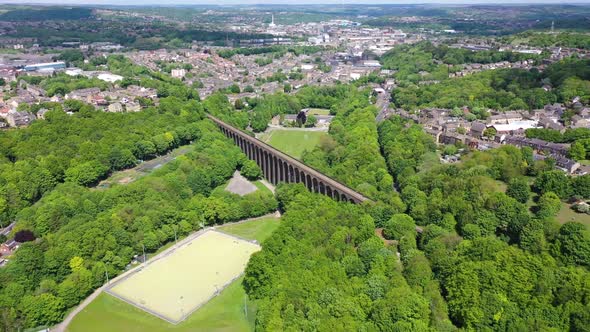 Aerial footage of a scenic view of the Lockwood Viaduct located in the town of Huddersfield in UK