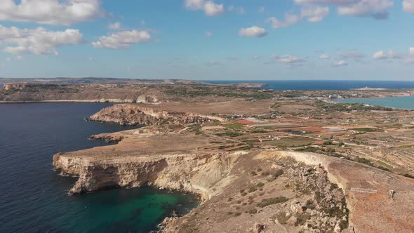 Aerial drone video from northern Malta near the Ghajn Znuber Tower.