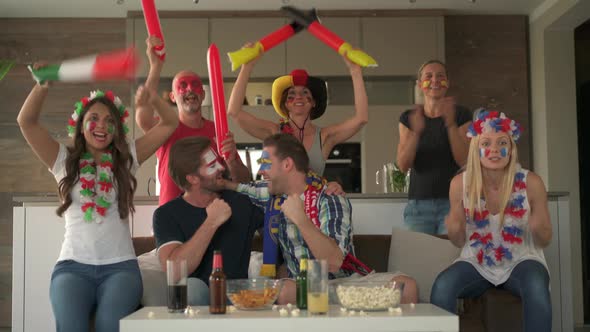 Friends Cheering Teams of Different Countries