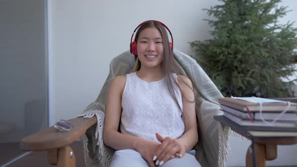 Web Conference POV of Charming Positive Young Asian Woman Waving Talking and Smiling