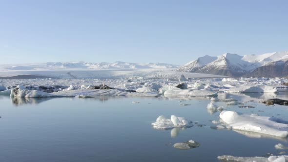 Glacier Lagoon in Iceland Filled With Icebergs Low Flight