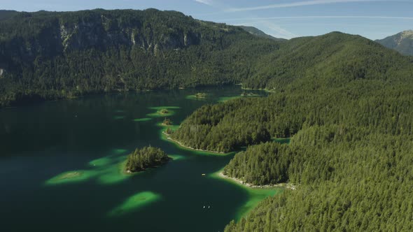 The amazing lake Eibsee in Germany, aerial shot filmed by drone