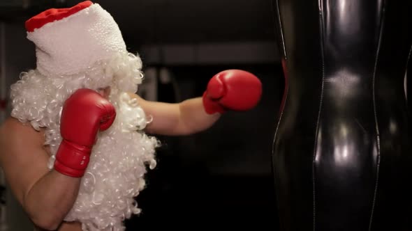 Santa Claus Beats Boxing Bag Angry Santa Claus